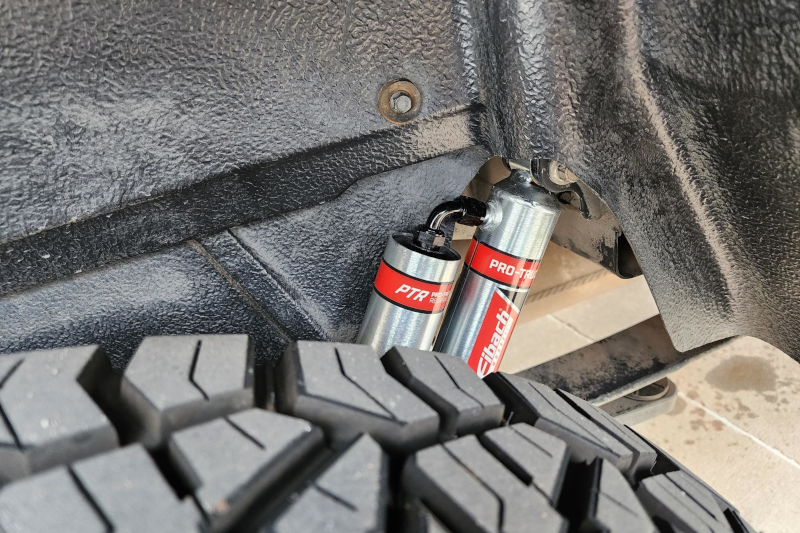 Eibach Pro-Truck Reservoir rear shock installed on a Ford F150 with the external canister visible